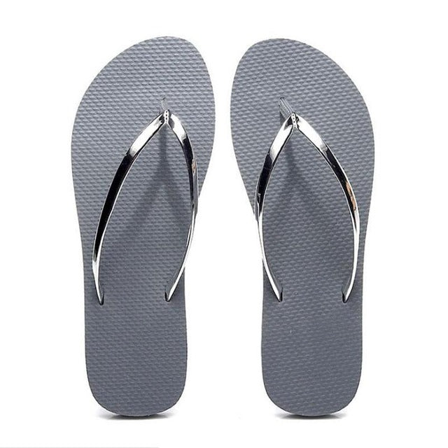 metallic silver flip flops