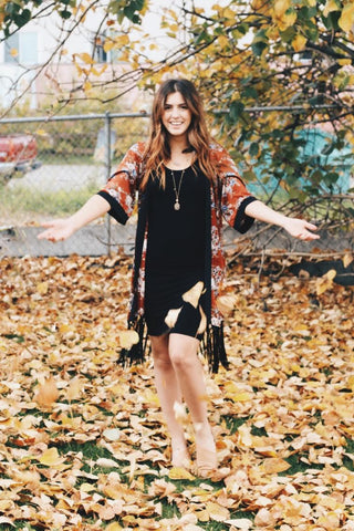 fall photo with leaves and black body con