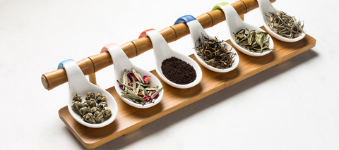 A range of artisanal teas from Rujani Tea in six white spoons