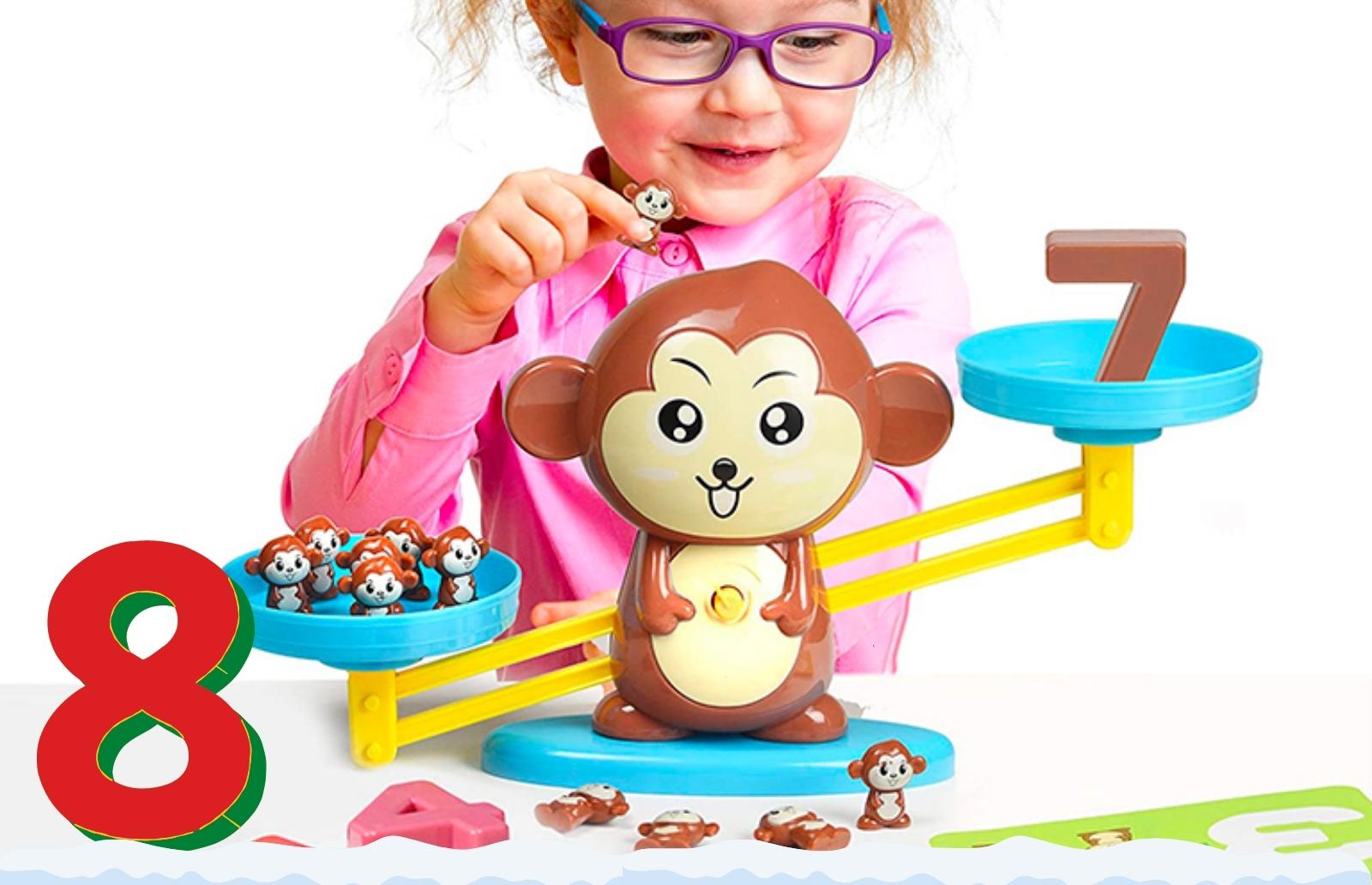 a-granddaughter-playing-balance-math-game-with-pet-figurines