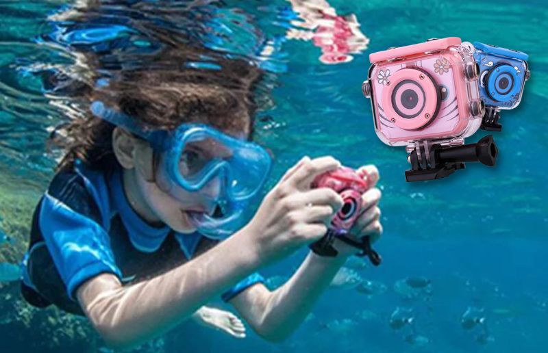 a girl using the mini kids high quality sports camera underwater