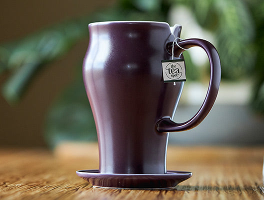 purple ceramic tea mug