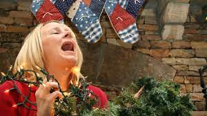 Stock Image of Woman Stressed Surrounded by Holiday Decorations