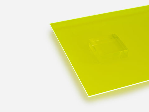 A fluorescent yellow acrylic sheet on white background
