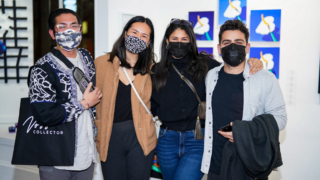 Photograph of four people wearing face masks during Tim Irani and Neddie Bakula's "Double Vision" duo exhibition post analog surrealist VIP Collectors Event at Voss Gallery, San Francisco, February 2021.