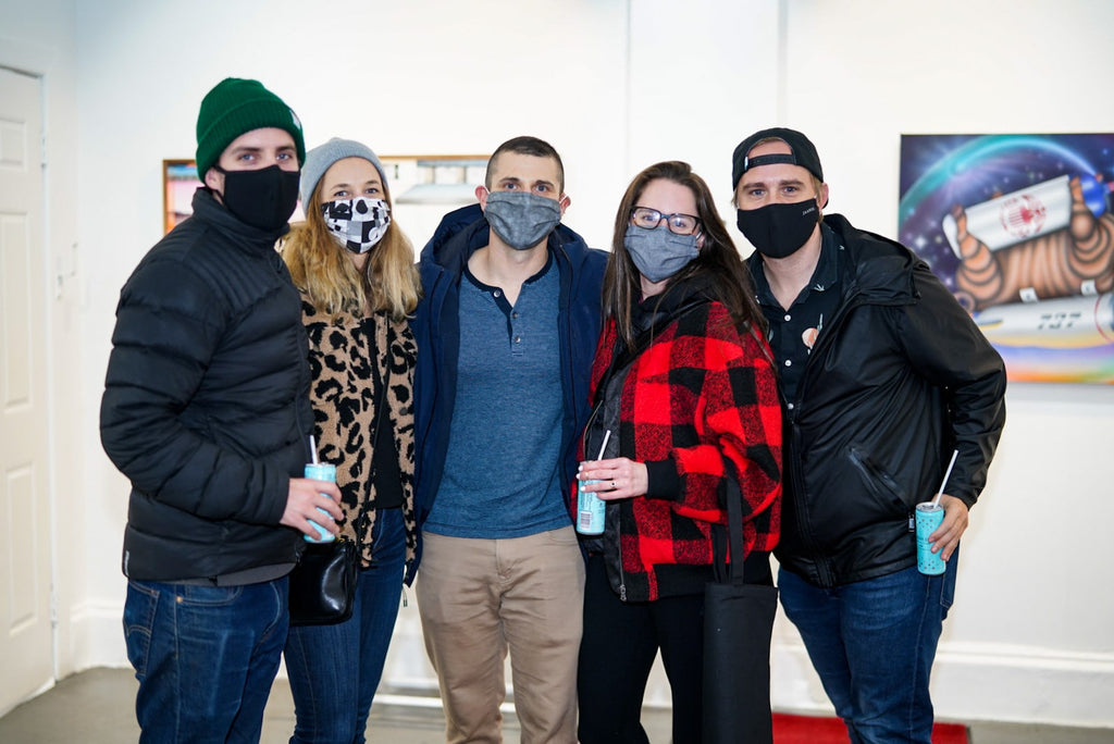 Photograph of a group of people during Tim Irani and Neddie Bakula's "Double Vision" duo exhibition post analog surrealist VIP Collectors Event at Voss Gallery, San Francisco, February 2021.