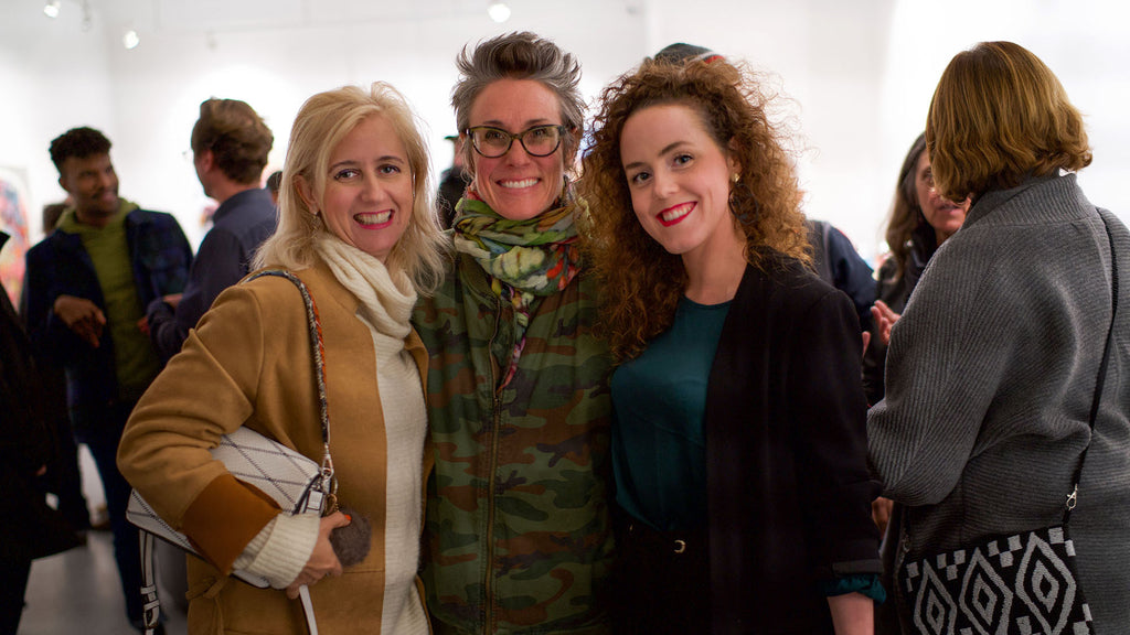 Install image from Gale Hart's "The Hood" solo exhibition at Voss Gallery, San Francisco in November 2019. Ashley Voss (right), Renee DeCarlo and company attending the opening night event.