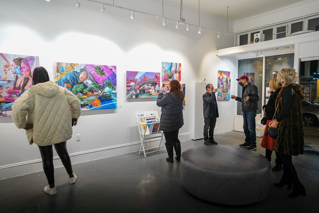 Photograph of gallery guests during Ian Robertson-Salt's "Nine to Five" spotlight exhibition Opening Reception of New Contemporary paintings at Voss Gallery in San Francisco, January 2022.