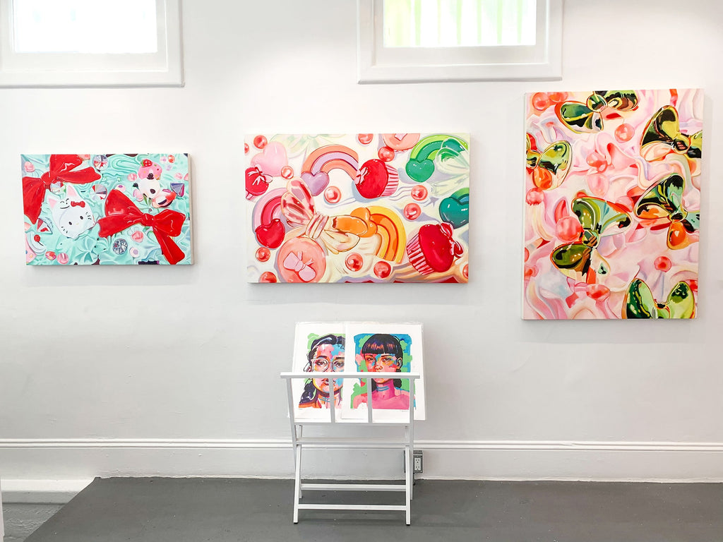 Photographs of Ingrid V. Wells's "Sweet Fascination" solo exhibition of kitschy oil paintings at Voss Gallery in San Francisco, March 2020.