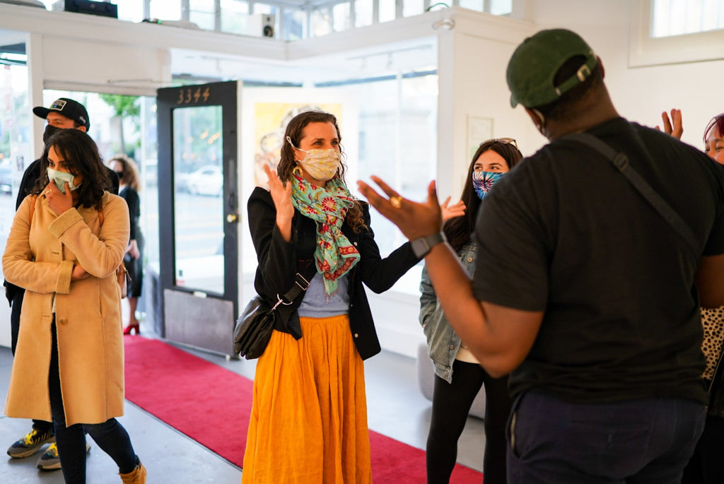 Photograph of people attending Khari Turner's "Hella Water" solo exhibition Opening Reception at Voss Gallery, San Francisco, May 21, 2021.