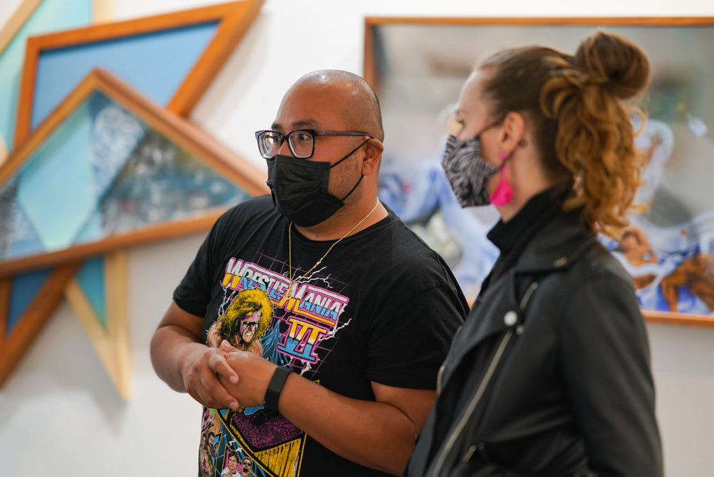 Photograph of people viewing artwork during the "Layers" opening reception featuring work by John Osgood and Trent Thompson at Voss Gallery, San Francisco on August 6, 2021.