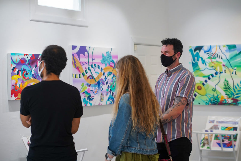 Photograph of three viewing artwork during Joshua Nissen King's "Fruit of Another"solo exhibition Meet the Artist Event at Voss Gallery, San Francisco, September 12, 2020.