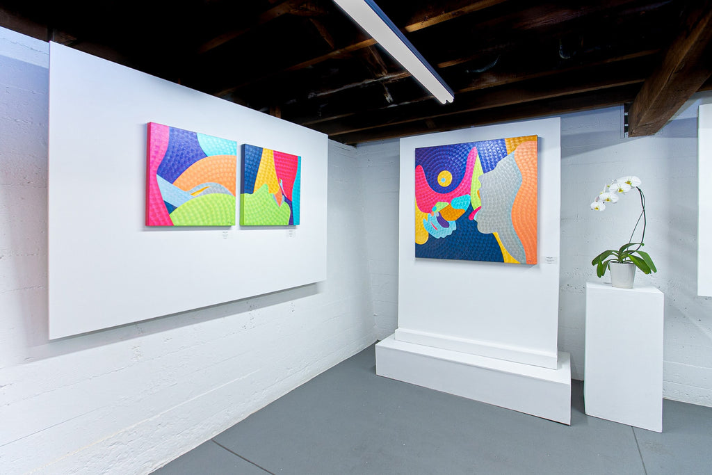 Natalia Lvova's "Confections" solo exhibition of erotic oil paintings was on view at Voss Gallery in San Francisco, February 15-29, 2020. Photograph of three paintings installed in the gallery's [The Down Low].