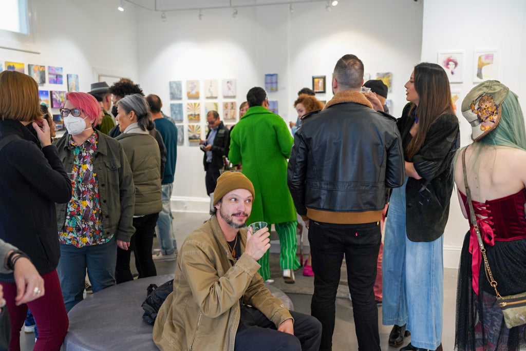 Photograph of people during the Postcards from Paradise Juried Group Exhibition Opening Reception at Voss Gallery in San Francisco, May 26, 2023.