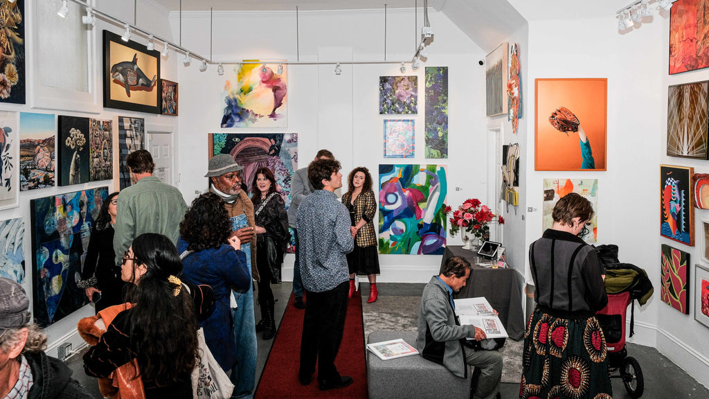 Photograph of people attending the "Refusés of the Bay" Group Exhibition Opening Reception at Voss Gallery, San Francisco, September 29, 2023.