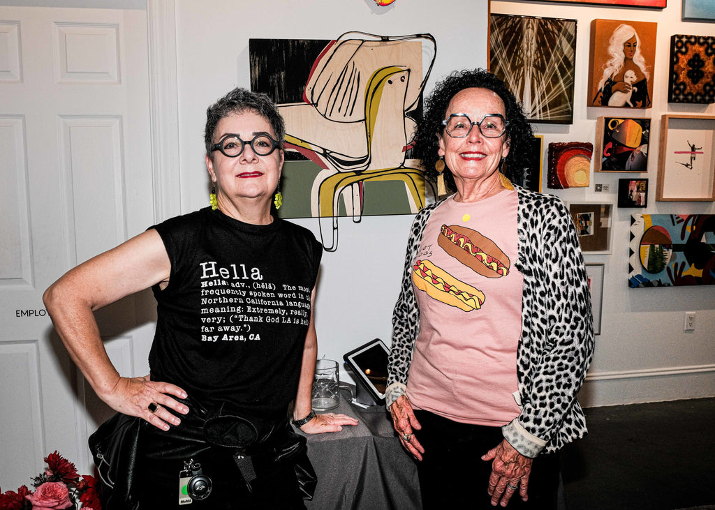 Photograph of two elderly guests during the "Refusés of the Bay" Group Exhibition Opening Reception at Voss Gallery, San Francisco, September 29, 2023.