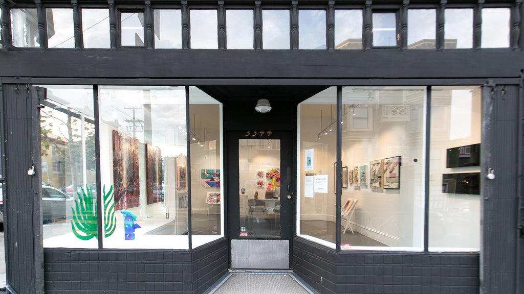 Install image of "The Essentials" group exhibition at Voss Gallery, San Francisco in December 2019-February 2020. Photograph of the front entrance looking in at the gallery.