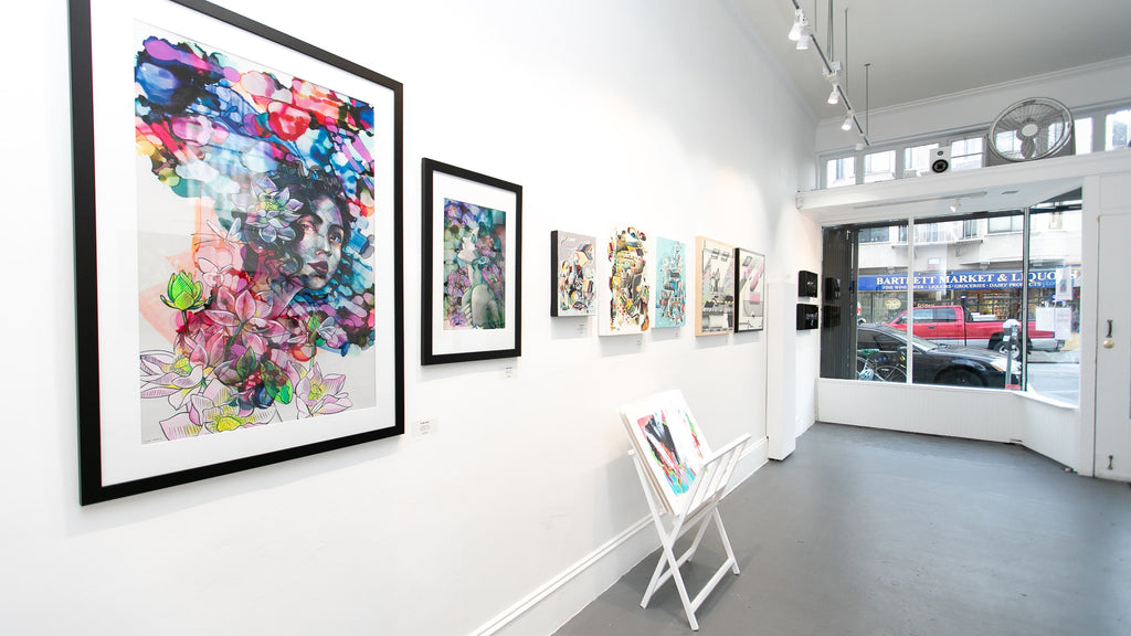 Install image of "The Essentials" group exhibition at Voss Gallery, San Francisco in December 2019-February 2020. Photograph of Amandalynn's work hanging in the gallery. View from the inside looking out towards the front of the space.