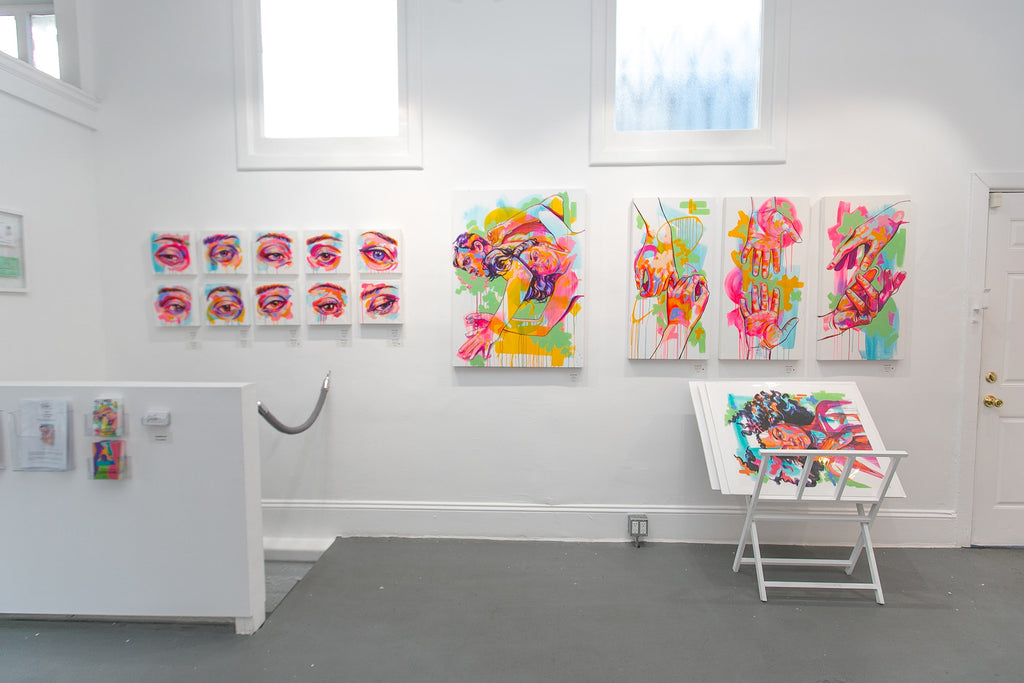 Photograph of The Tracy's work installed at Voss Gallery. The Tracy Piper's "All I Need" solo exhibition of vibrant figurative paintings was showing at Voss Gallery in San Francisco, February 7-29, 2020.