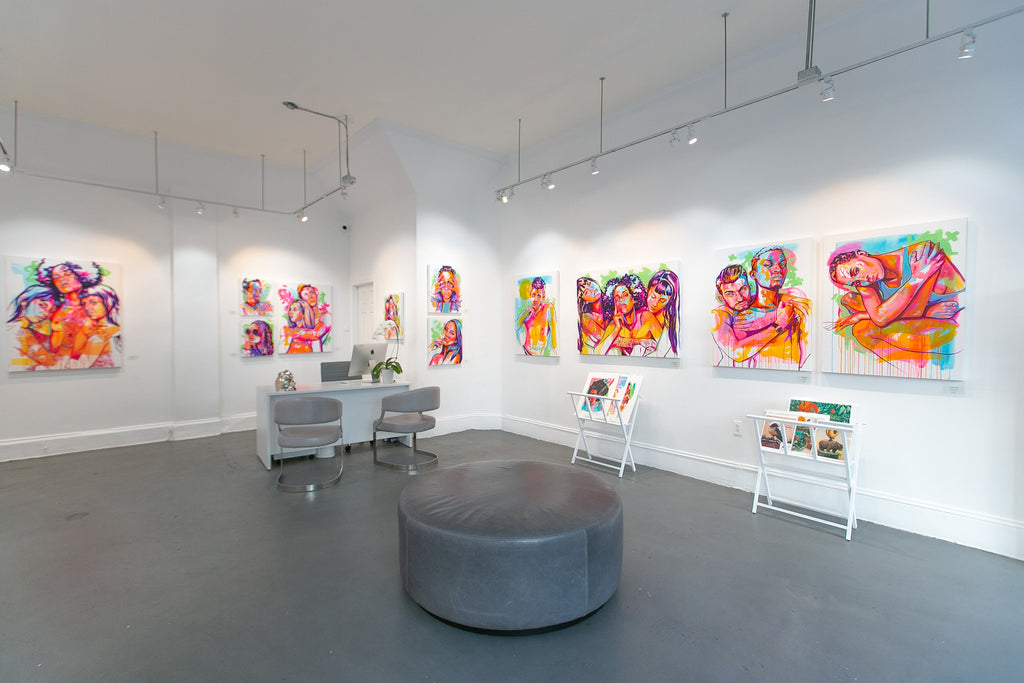Paintings installed on the gallery's spotlight wall. The Tracy Piper's "All I Need" solo exhibition of vibrant figurative paintings was showing at Voss Gallery in San Francisco, February 7-29, 2020.