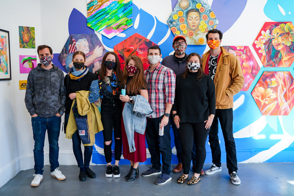 Photograph of people wearing face masks attending the Paradise group exhibition VIP Collectors Event at Voss Gallery, San Francisco, April 2021.