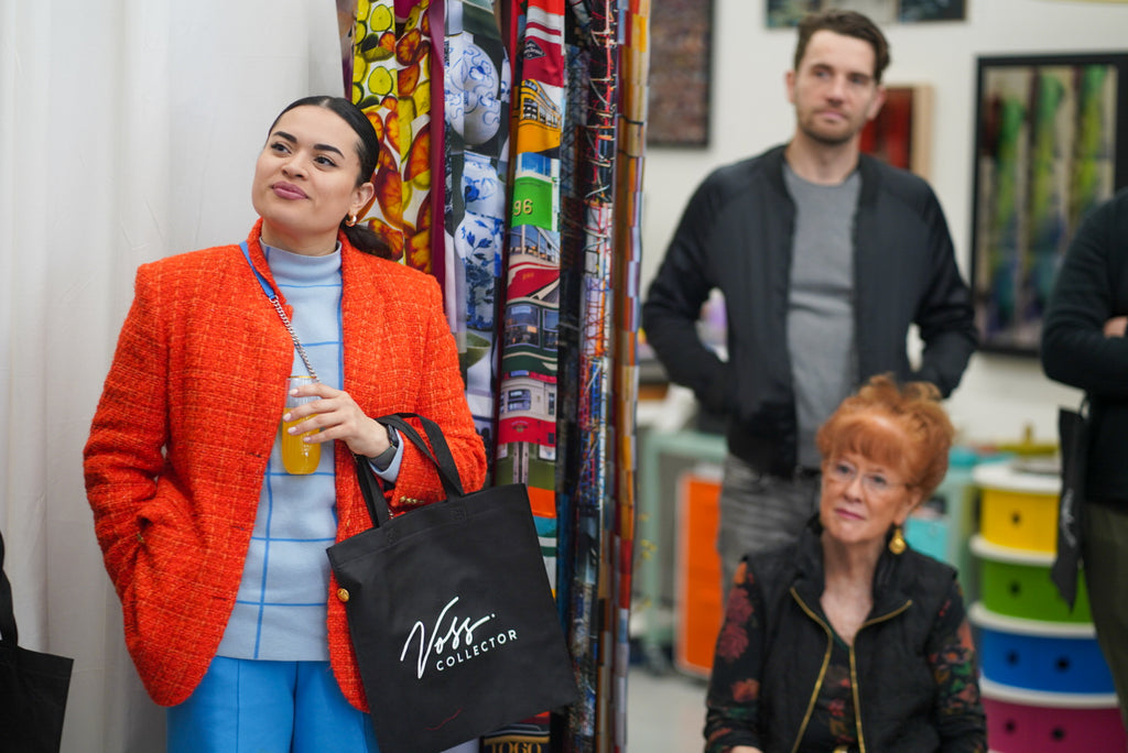 Photograph of three people during the 'Art Unveiled: Collectors Mixer' at Voss Collector Club's visit to 1890 Bryant Studios, San Francisco, on March 10th, 2024.