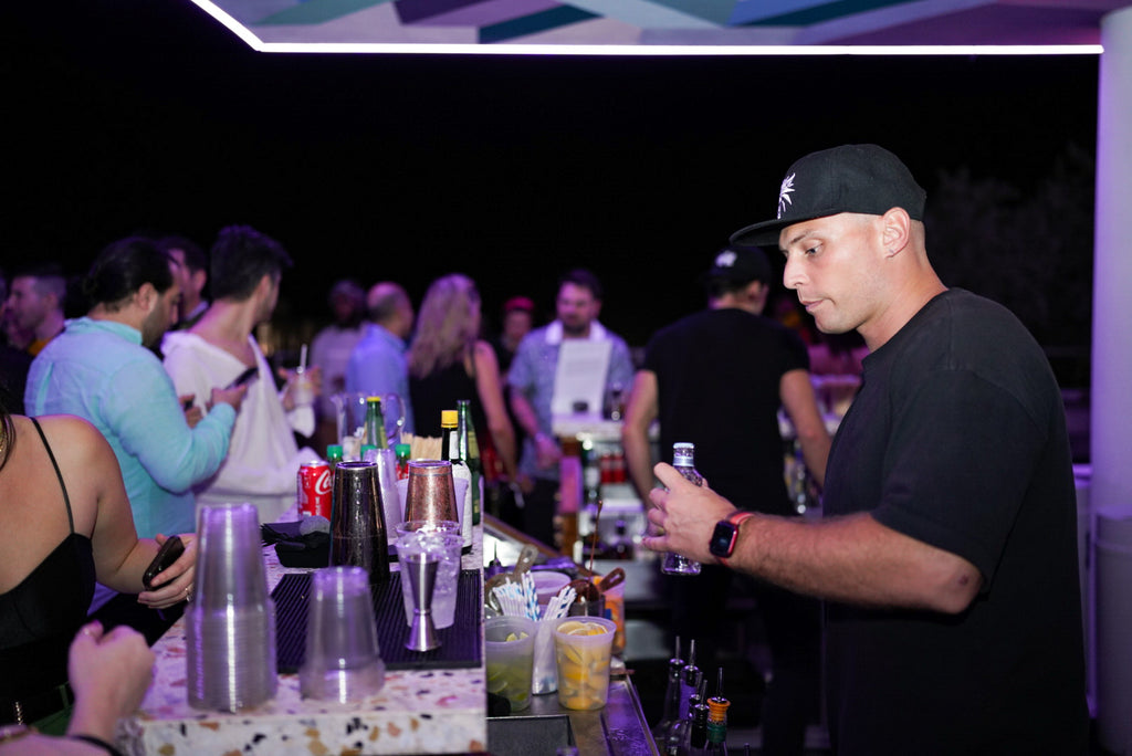 Photograph of a bartender at the Moxy Afterparty Art Basel Event in Miami Beach, December 2023.