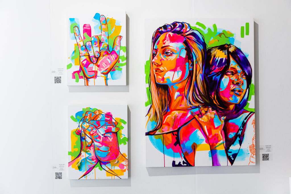 Photograph of The Tracy Piper's paintings exhibited during the SCOPE Art Show in Miami Beach, December 2021.