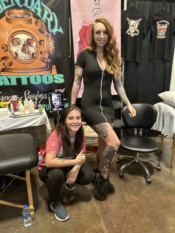 Kaylee Tattooing Cat at the Tampa Tattoo Convention 