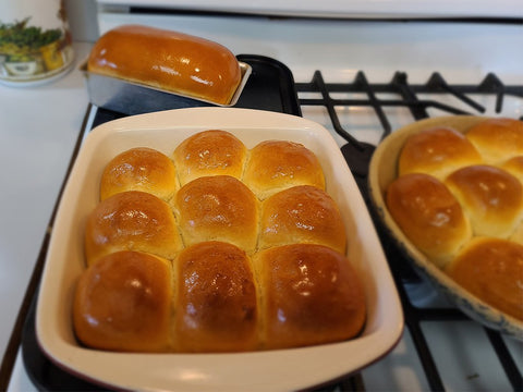 Fully baked, golden brown dinner rolls that I made using real Vermont maple syrup.