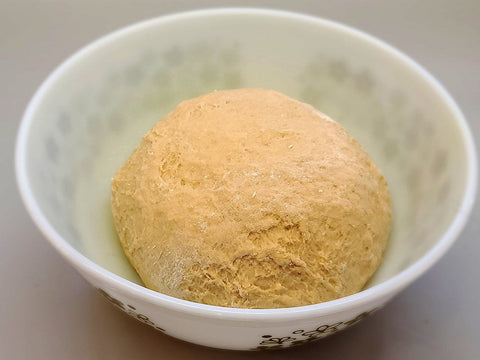 Dough that has been kneaded and is ready to rise.