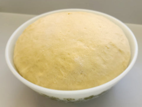 Roll dough that has risen to double in size.
