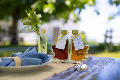 Our elegant wedding favor- Split Leaf Bottle tying together the perfect wedding table setting.