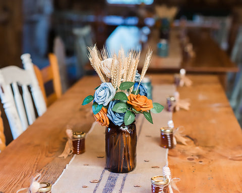 Country themed wedding favors at each place setting.