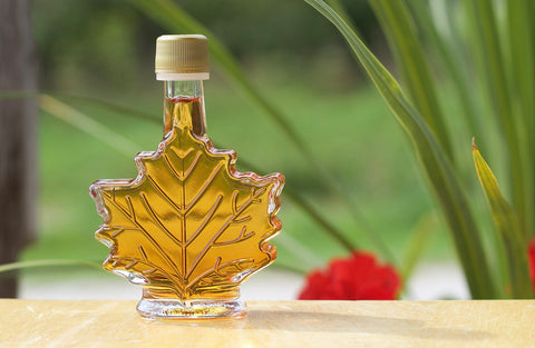 Maple syrup for a wedding favor showing the fine cut of the bottle.