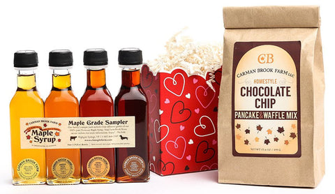 Holiday Maple Sampler Gift Box with a sampler kit of maple syrup and a chocolate chip pancake mix.