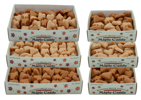 Boxes of maple candy in heart and maple leaf shapes.