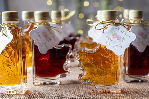 Hang Tags by Karla Brown Designs from Etsy displayed on maple syrup wedding favors.