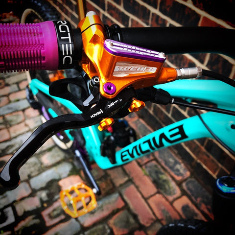 Evil calling custom build with orange hope brakes with purple accessories