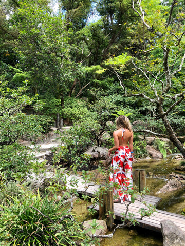 Morikami Japanese garden with girl in a floral jumpsuit from Baliawear.com