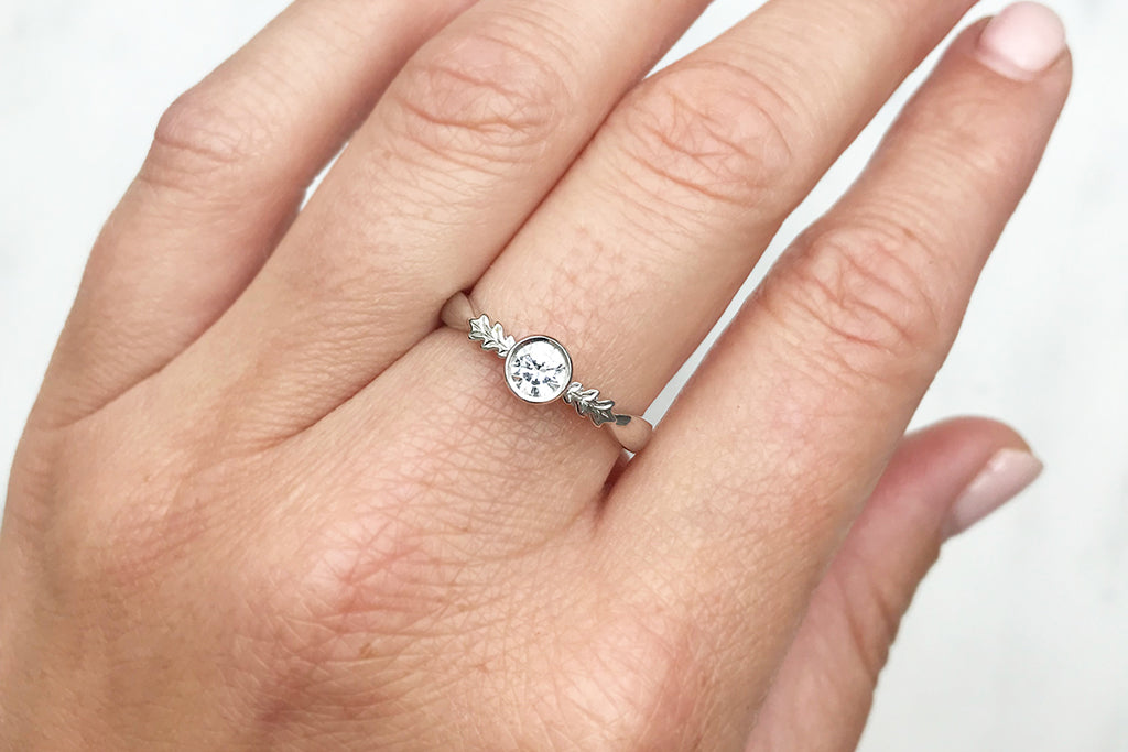 Bespoke Louise nature inspired engagement ring 18ct recycled white gold and 0.31ct recycled diamond on