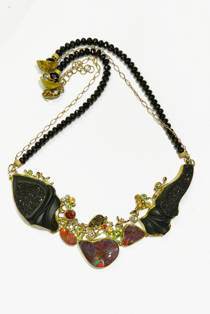 Boulder opal necklace in high karat gold. Designer Jewelry