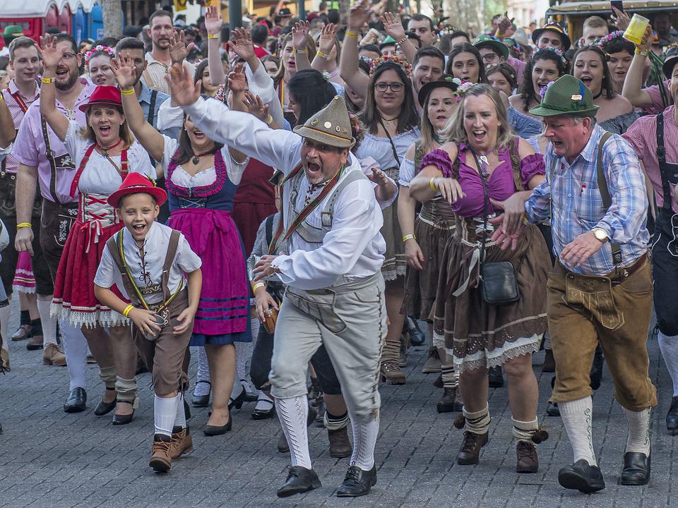 people in lederhosen at Oktoberfest