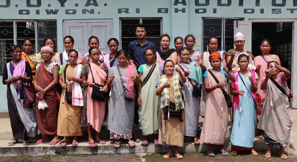 Khraw with Eri silk spinners in Diwon, Meghalaya, India  Muezart