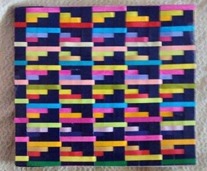 One of her first weaving project - A woven book cover made while in school | Muezart