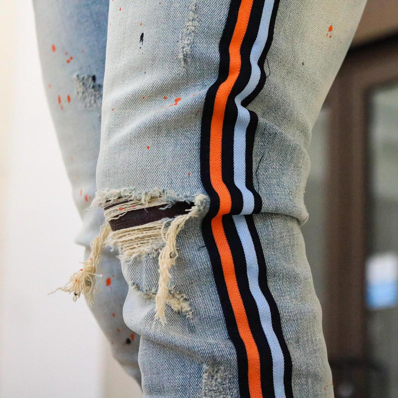blue jeans with orange stripe
