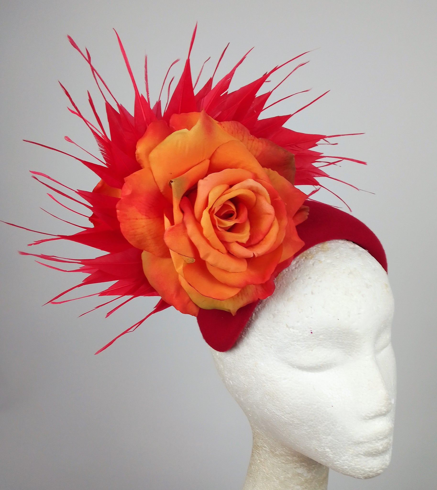 red and orange fascinator