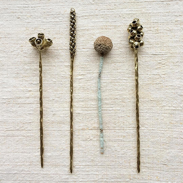 An Instagram post by Environmental fiber artist and writer Abigail Doan 2016 collection features Kirsten Muenster's hair sticks.