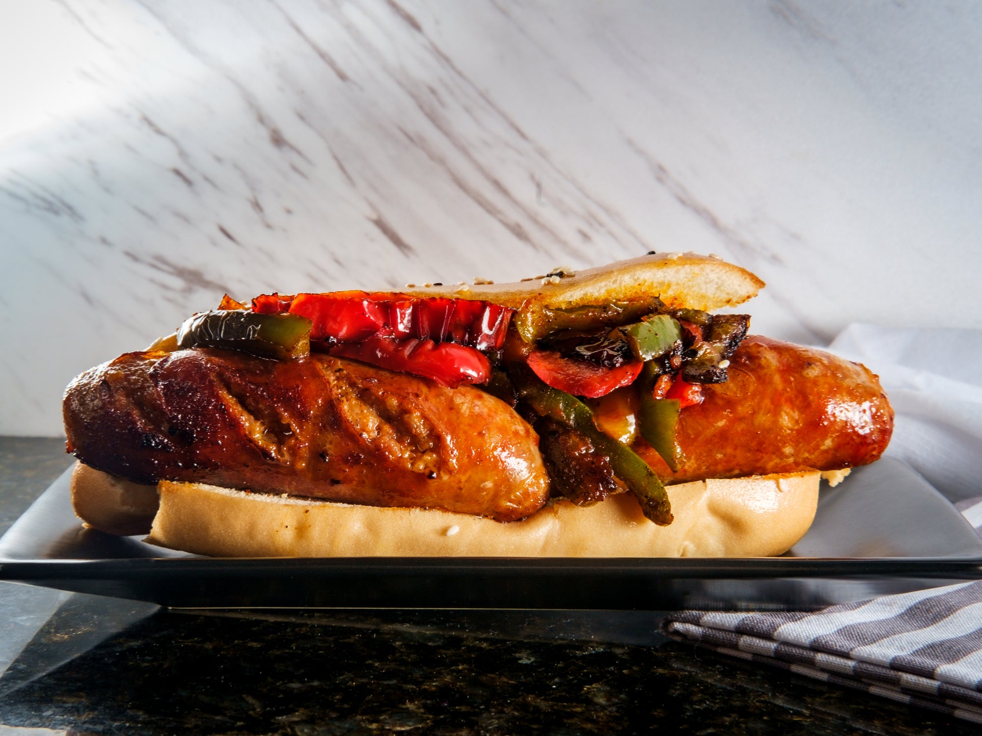 https://cdn.shopify.com/s/files/1/0093/2537/9669/files/Grilled_Sausage_Peppers_Onions_2048x2048.jpg?v=1633957870