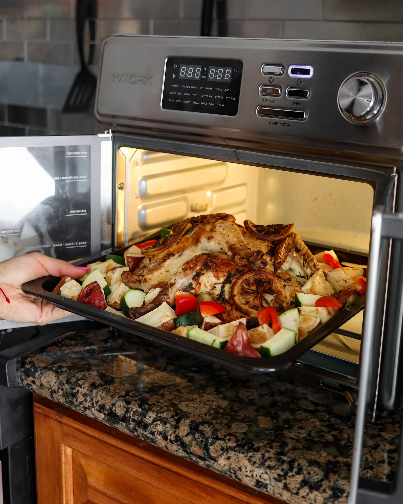 Nathalie C Fit Makes a Whole Chicken in Her Kalorik MAXX Air Fryer Oven